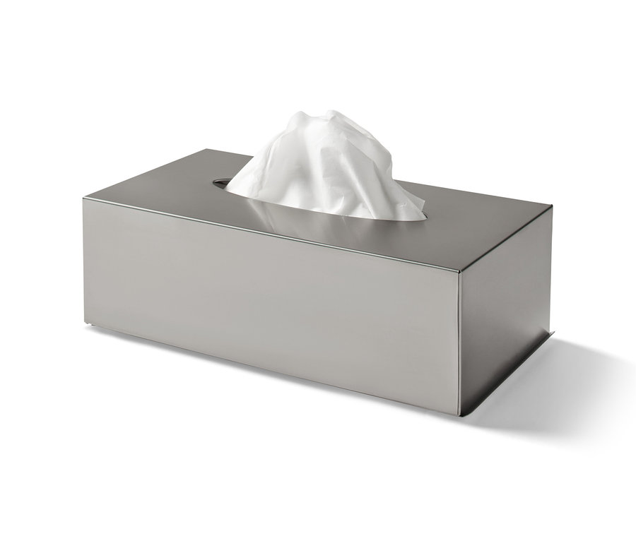 Ein Kosmetiktuchspender aus Metall mit weißen Tüchern.