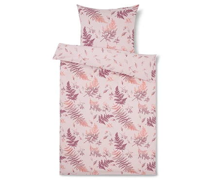 Bettwäsche-Set mit Farn- und Blumenmuster in Rosa- und Lilatönen.