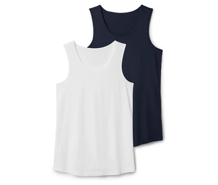 Zwei Tanktops, eines in Weiß und eines in Dunkelblau, liegen übereinander.