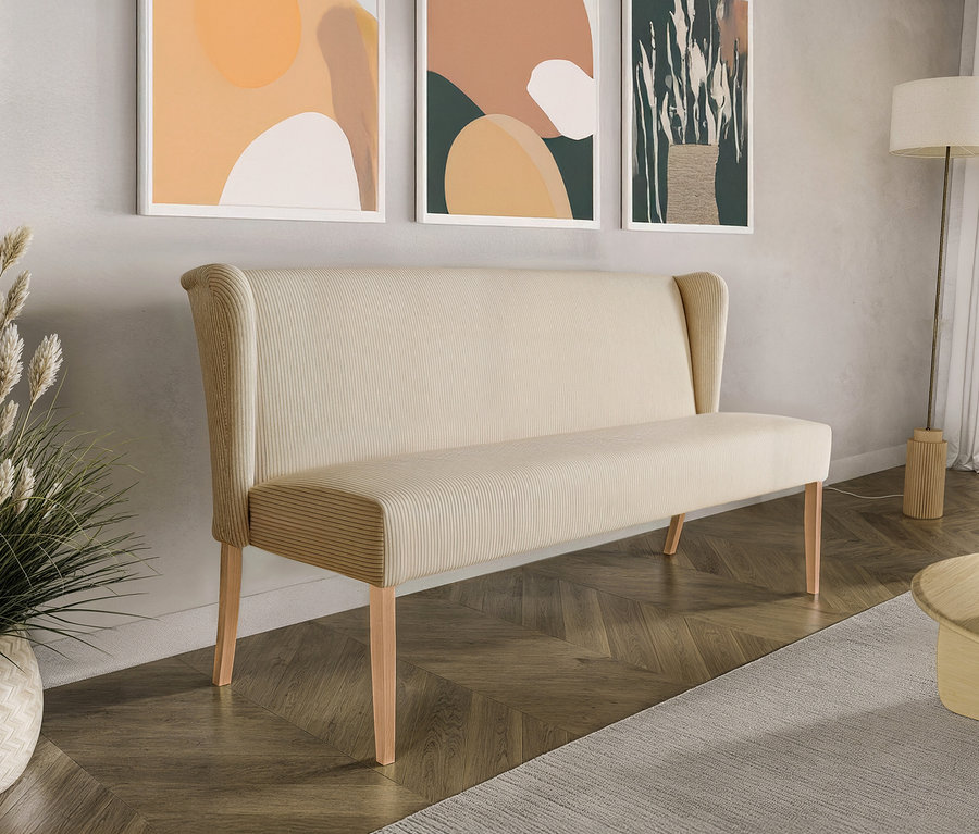 Cremefarbene Polsterbank »Hendrick« mit Cordstoff steht in einem Wohnzimmer.
