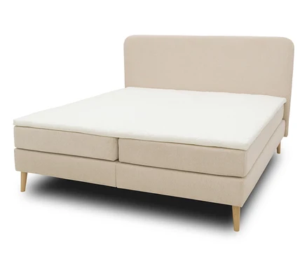 Ein DOMO collection Boxspringbett mit festem Kopfteil, ca. 180 x 200 cm, inklusive Topper.