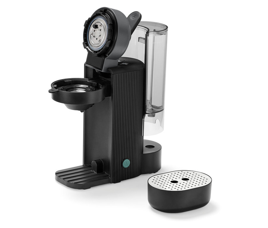 Detailaufnahme einer »Call me Pad« Kaffee Padmaschine Graphite mit geöffnetem Behälter und abnehmbarer Tropfschale.