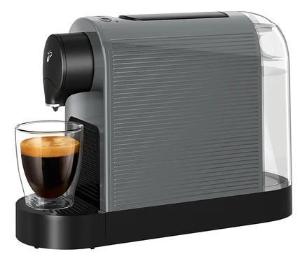 Graue Cafissimo pure+ Kaffeemaschine mit einer Tasse Kaffee.
