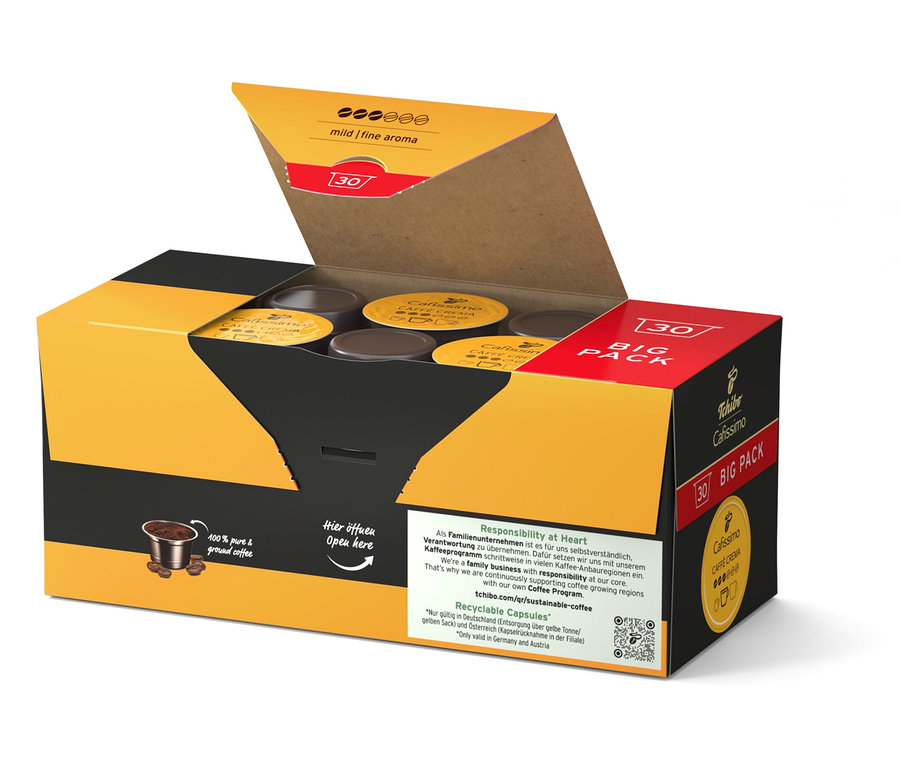Geöffnete gelb-schwarze Packung Cafissimo Caffè Crema mild 30 Kapseln und eine große Packung Cafissimo Caffè Crema mild - 120 Kapseln.
