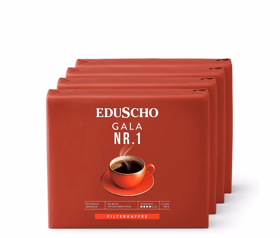 Vier Packungen Eduscho Gala Nr. 1 gemahlener Kaffee, jede in roter Verpackung mit einer Tasse Kaffee darauf.