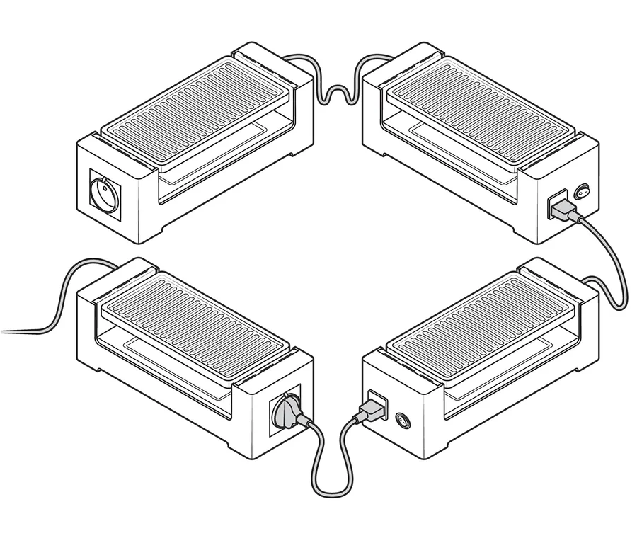 Vier Raclette für 2 Personen Grills sind in einem Quadrat angeordnet, jeder mit einem Stromkabel.