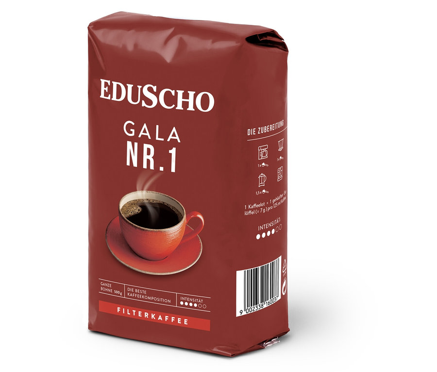 Eine Packung EDUSCHO Gala Nr. 1 Ganze Bohne mit einer Tasse Kaffee.