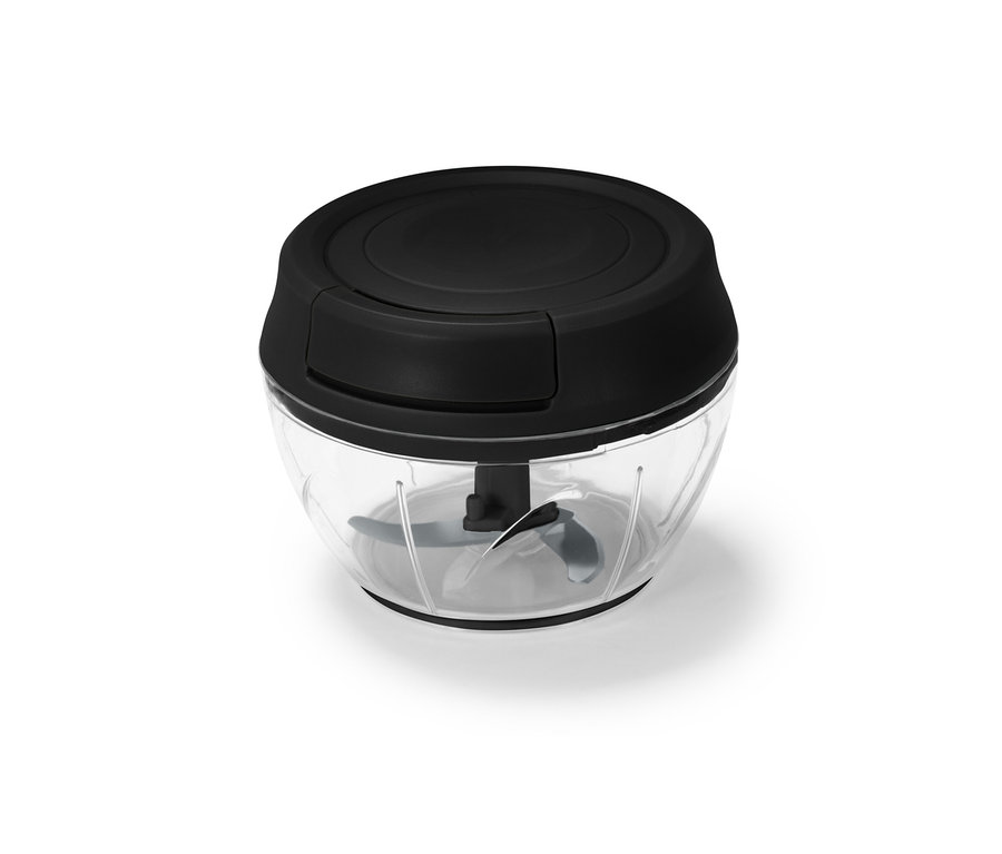 Detailaufnahme eines manuellen Multizerkleinerers mit schwarzem Oberteil und transparentem Behälter.