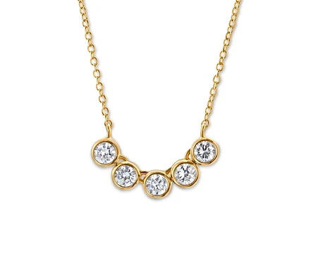 Goldene 925 Silber Kette Tennis Zirkonia mit fünf Zirkonia-Steinen.