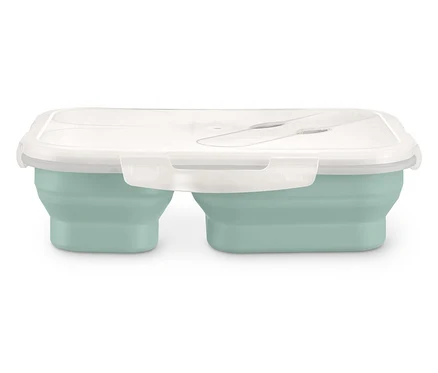 Eine geschlossene, hellgrüne, zusammenklappbare Lunchbox mit transparentem Deckel.