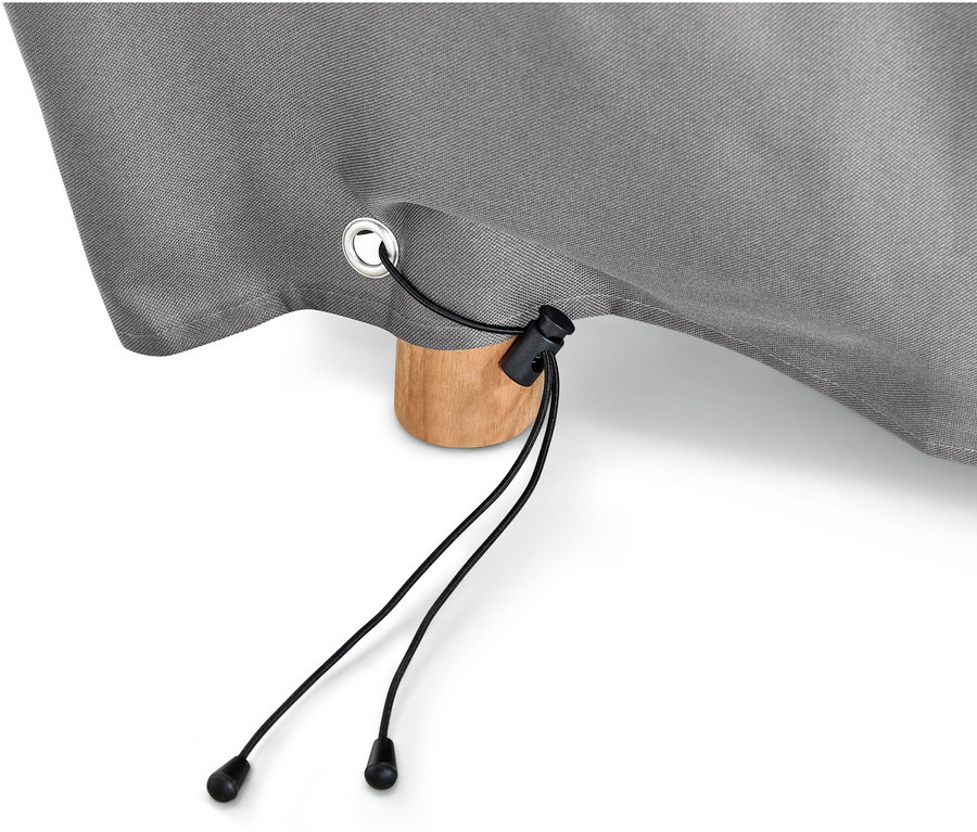Detailaufnahme einer grauen Premium-Abdeckhaube für große Ausziehtische mit schwarzem Kordelzug und einem hölzernen Tischbein.