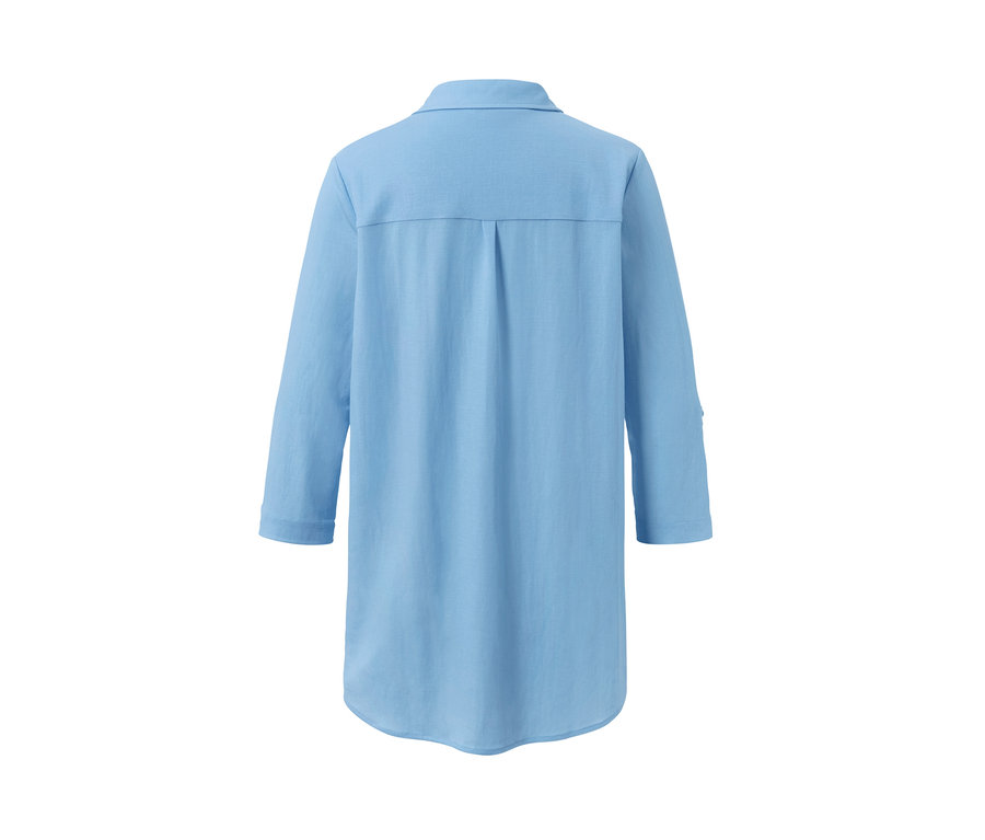 Hellblaue Piqué-Jerseybluse von hinten.
