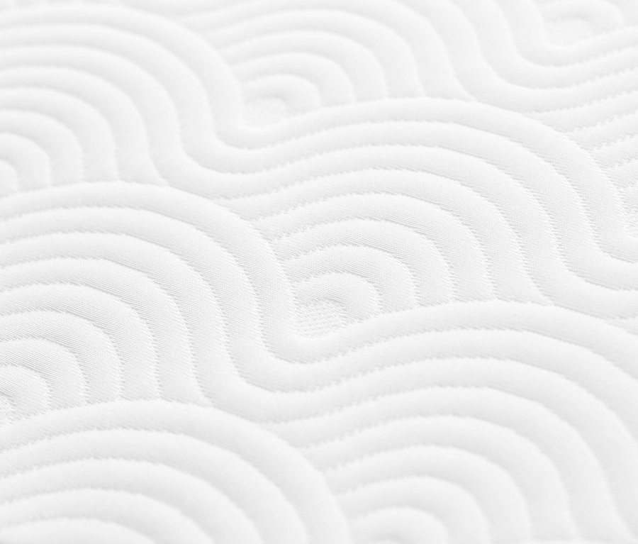 Detailansicht eines weißen TEMPUR ONE® Support Kissens mit gewellter Steppung.