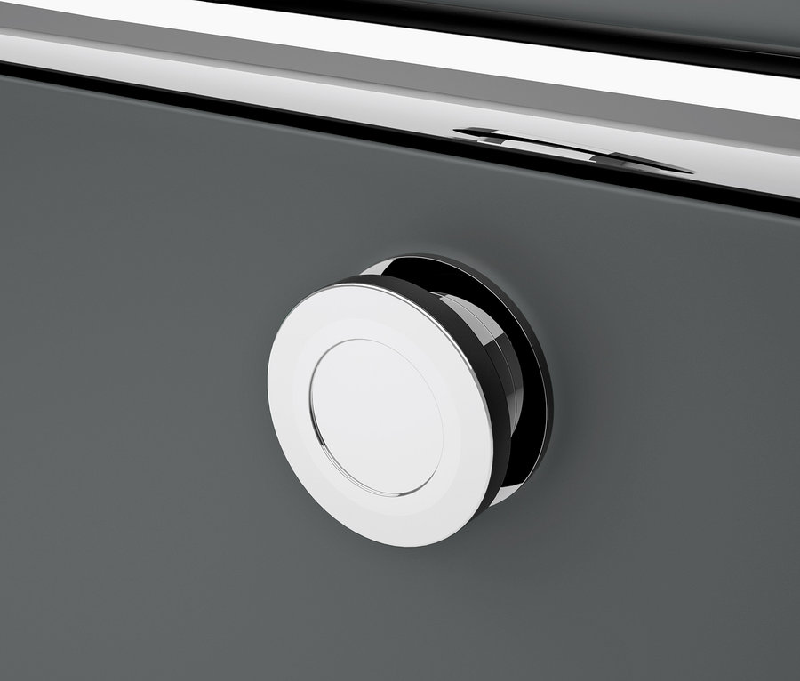 Detail einer grauen Metallkommode »CN3« mit 4 Klappenfächern und einem runden, verchromten Griff.