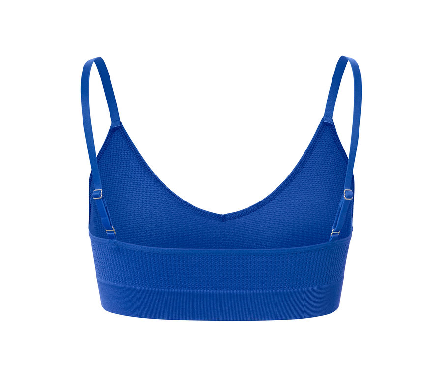 Detailansicht von der Rückseite eines blauen Seamless-Bustiers mit Struktur.