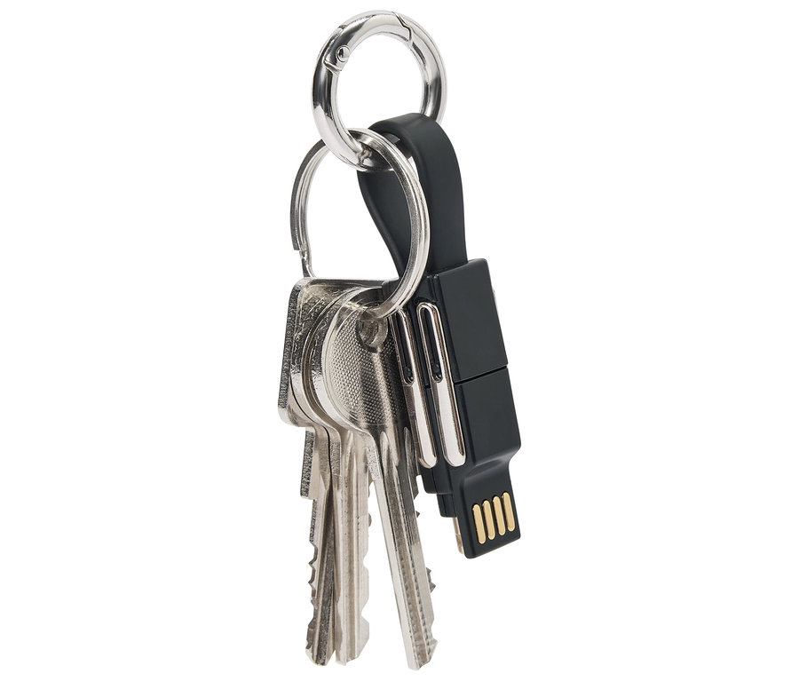 Schlüsselbund mit drei Schlüsseln und einem schwarzen USB-Stick an einem silbernen Ring.