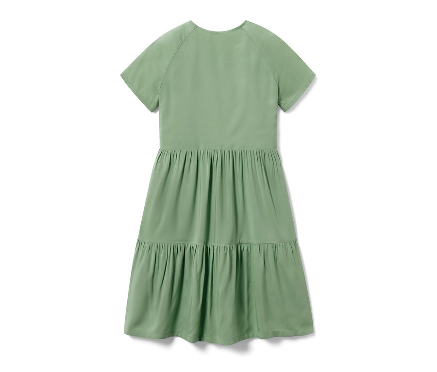 Abgebildet ist ein hellgrünes Kinder-Stufenkleid.