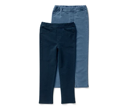 Zwei Kinder-Jeggings ‒ Fit »Mia« in Dunkelblau und Hellblau liegen übereinander.