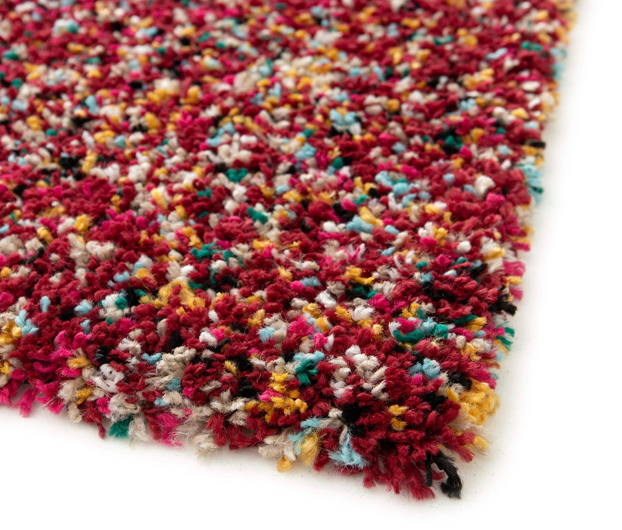 Detailaufnahme eines mehrfarbigen Zottelteppichs der Teppich »Relic«, autumn spice.