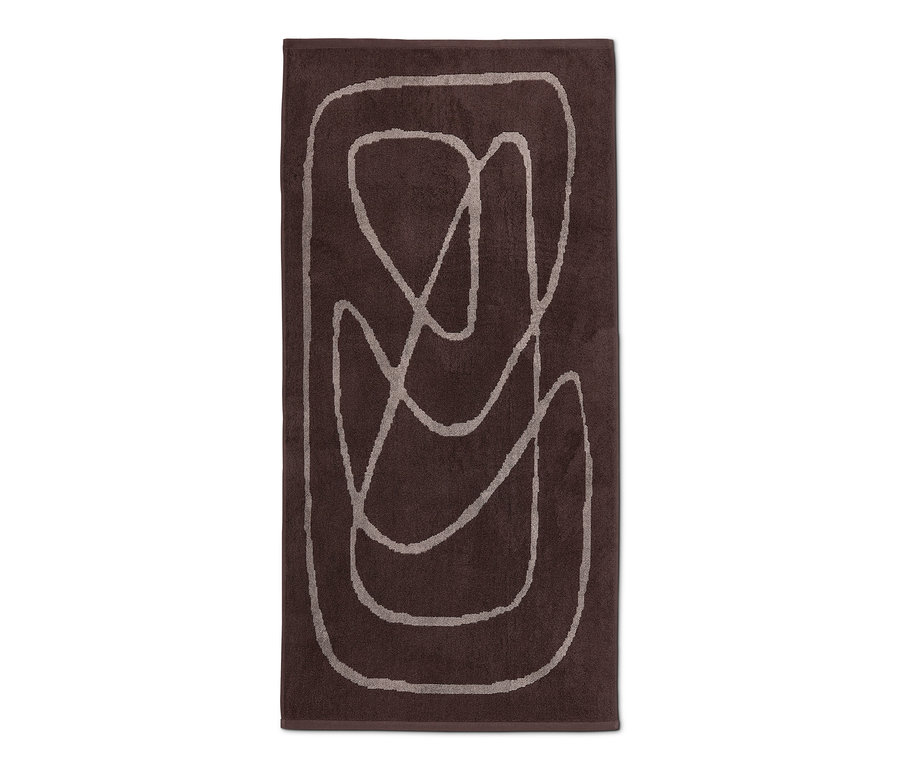 Ein braunes Jacquard-Badetuch mit abstraktem Muster.