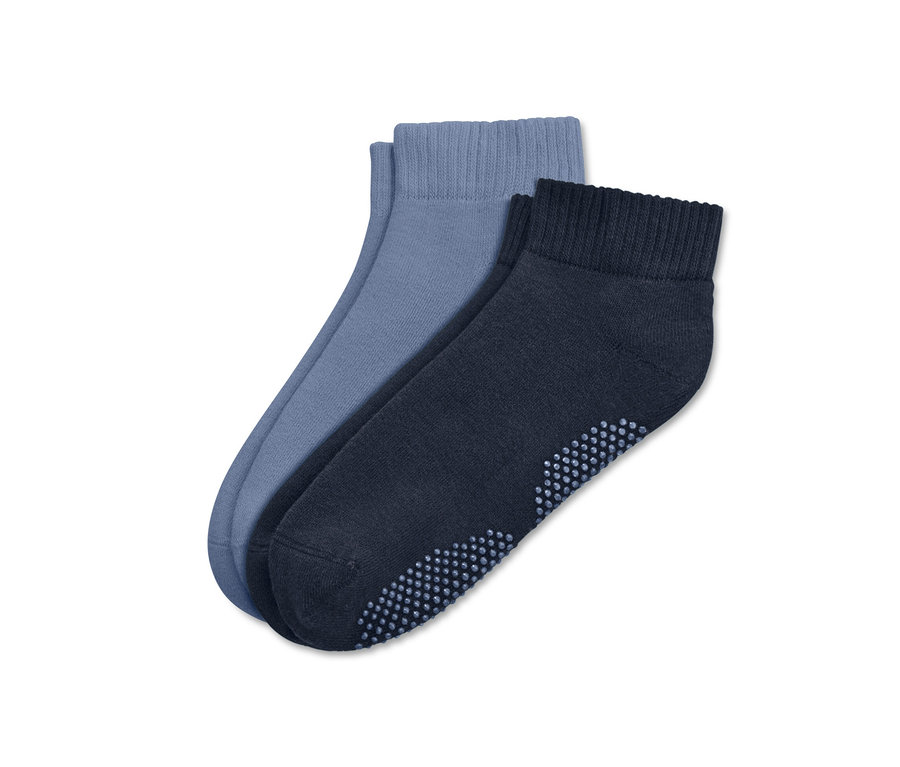 Zwei Paar Yogasocken, ein Paar blau und ein Paar marineblau.