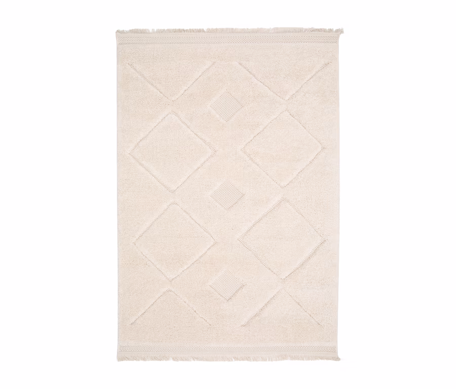 Beiger Indoorteppich »NATIVO Checks« mit geometrischem Muster.
