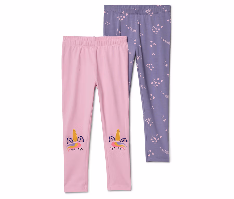Rosa Leggings mit Einhorn-Applikation neben lila Leggings mit Sternenmuster.