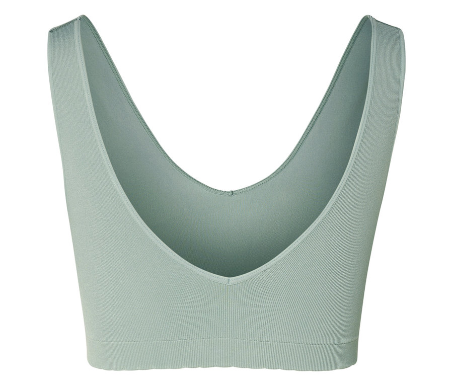 Nahaufnahme eines hellgrünen Sport-BHs mit V-Ausschnitt.