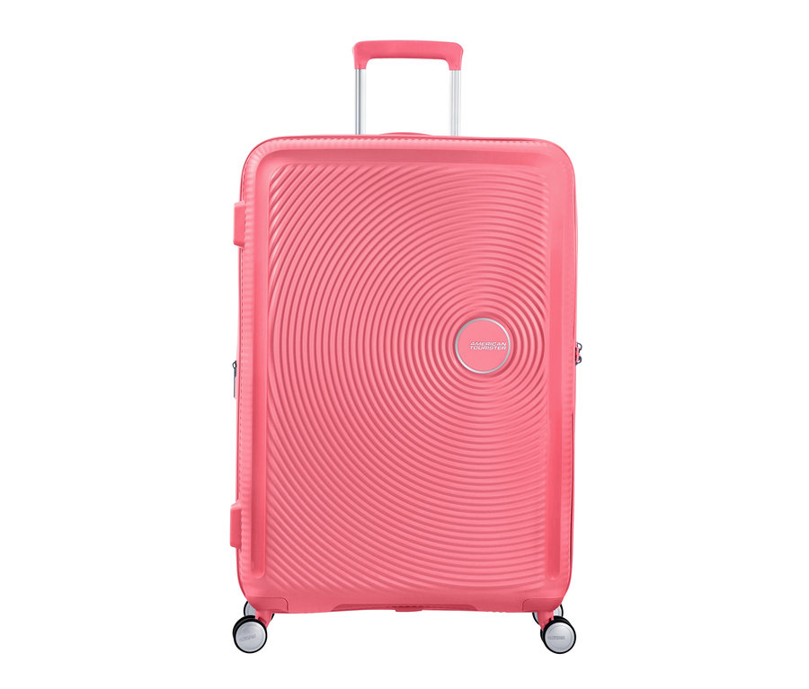 Abgebildet ist ein großer, sun kissed korallfarbener American Tourister Hartschalen-Koffer »Soundbox« Spinner.