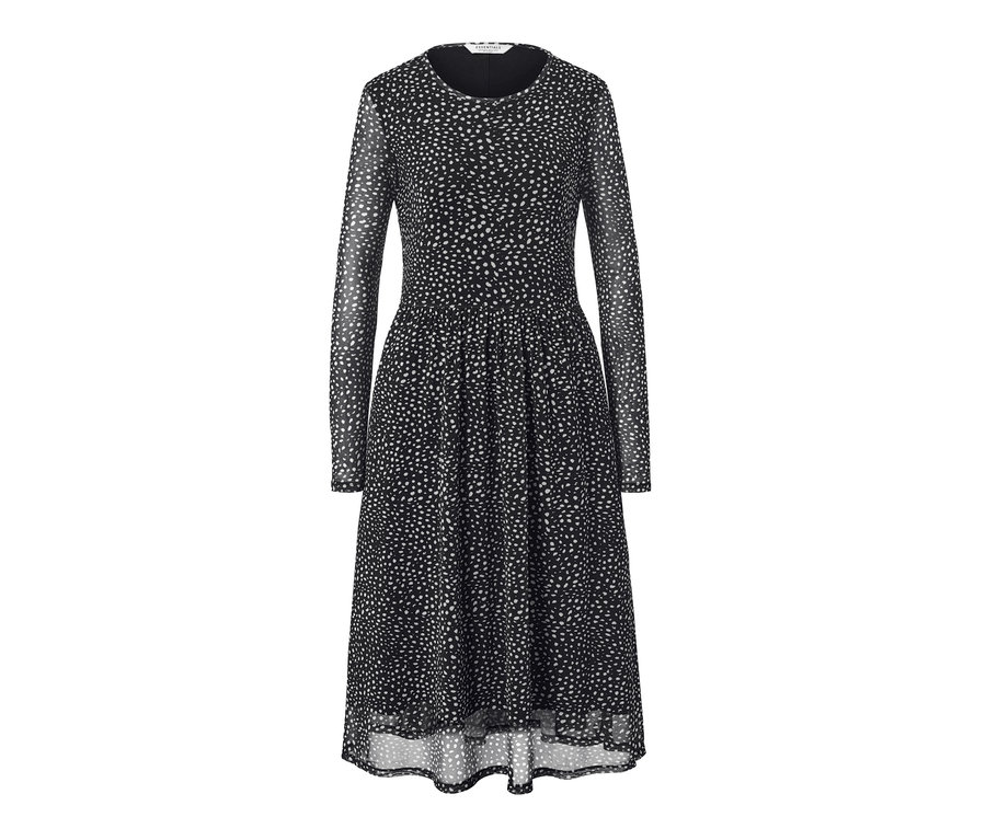 Ein schwarz gepunktetes Mesh-Kleid mit langen Ärmeln.