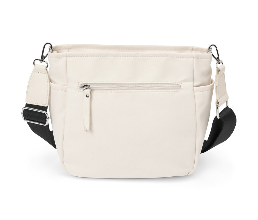 Cremefarbene Canvas-Umhängetasche mit schwarzem Riemen.