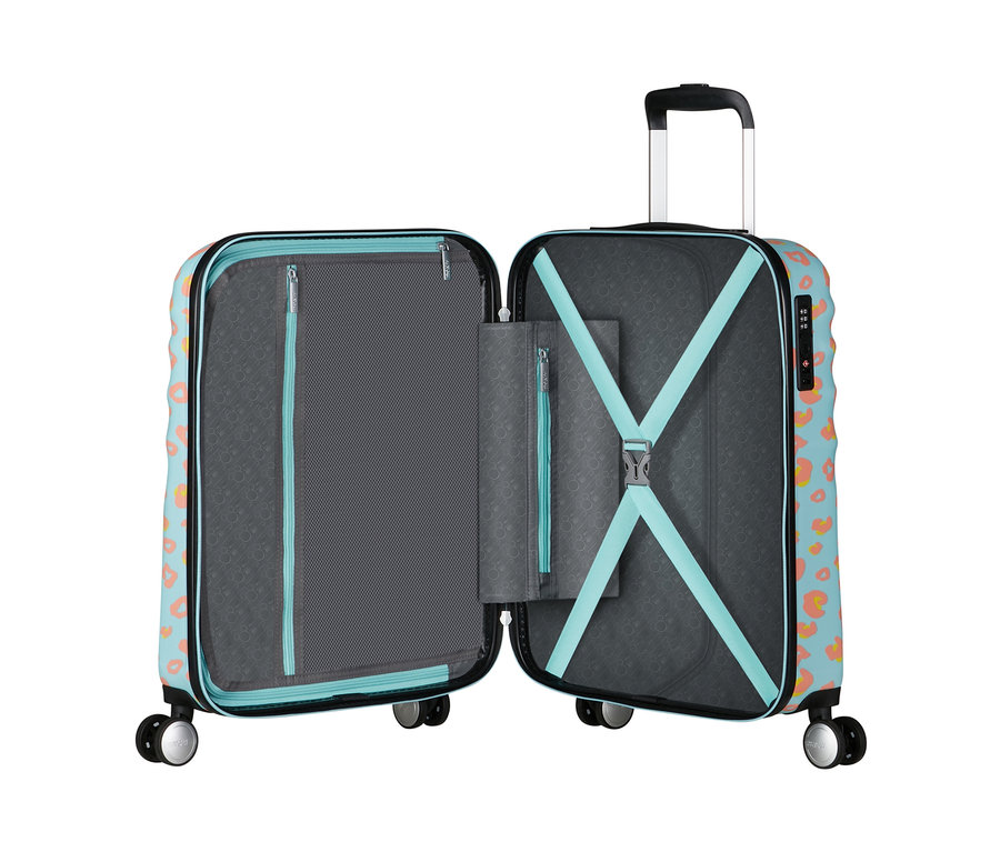 Geöffneter American Tourister Wavebreaker »Minnie Mouse« Koffer mit Minnie Mouse Muster.