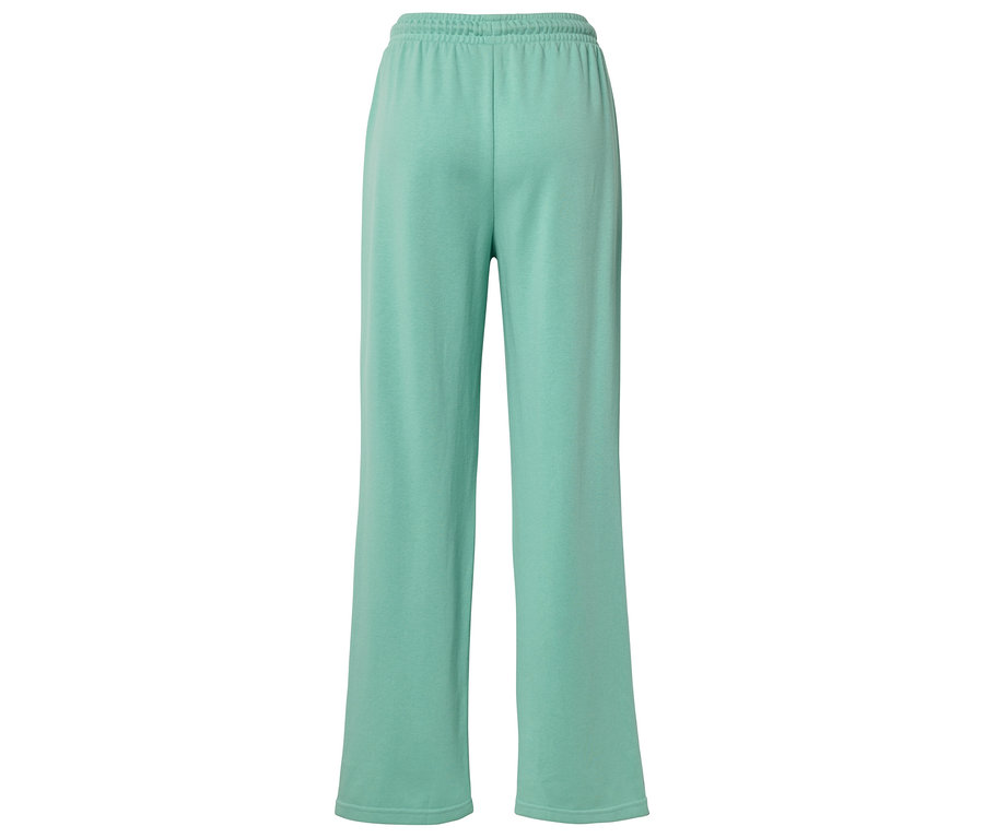 Rückansicht einer hellgrünen, locker sitzenden Hose mit elastischem Bund.