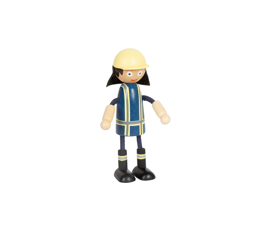 Holzfigur einer Frau mit braunen Haaren in gelbem Helm, blauer Weste und schwarzen Stiefeln.