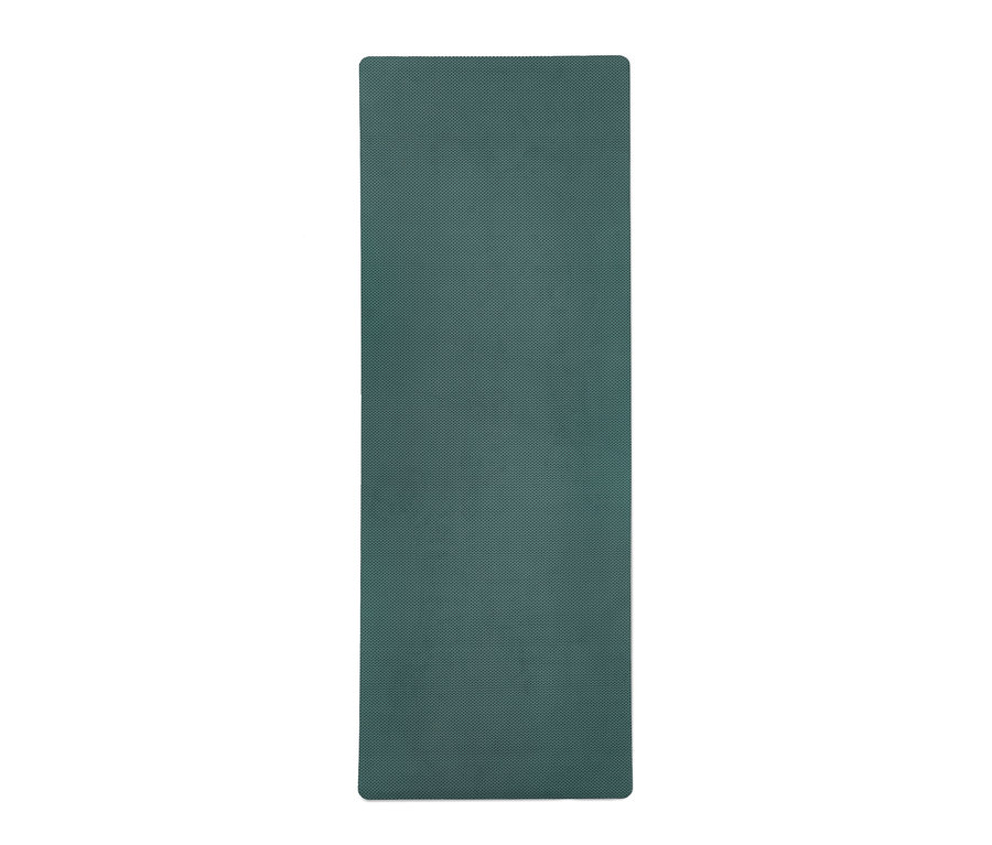 Eine grüne Yoga- und Fitnessmatte.