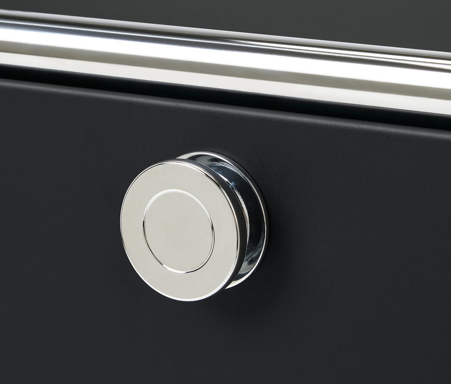 Detail einer Kommode Metall »CN3« mit Schublade, Klappenfach und Umrandung.