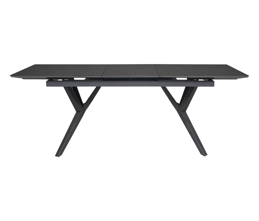Schwarzer Esstisch mit X-förmigen Beinen.