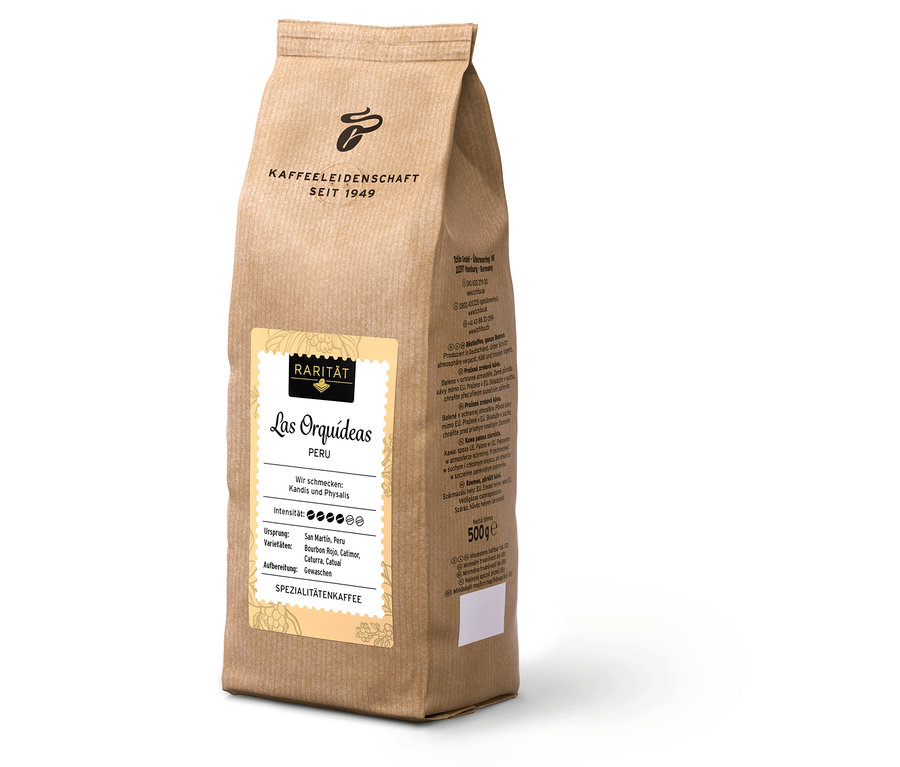 Eine 500-Gramm-Packung »Las Orquídeas Peru«-Kaffeebohnen steht auf einer weißen Oberfläche.