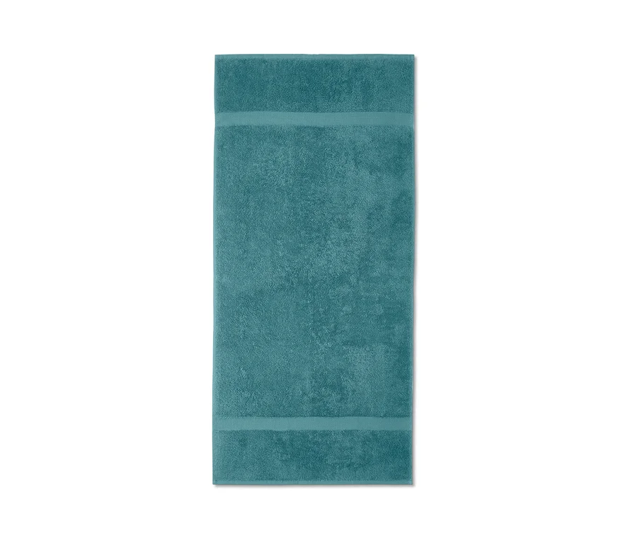 Detailansicht von 2 blauen Frottier-Handtüchern.