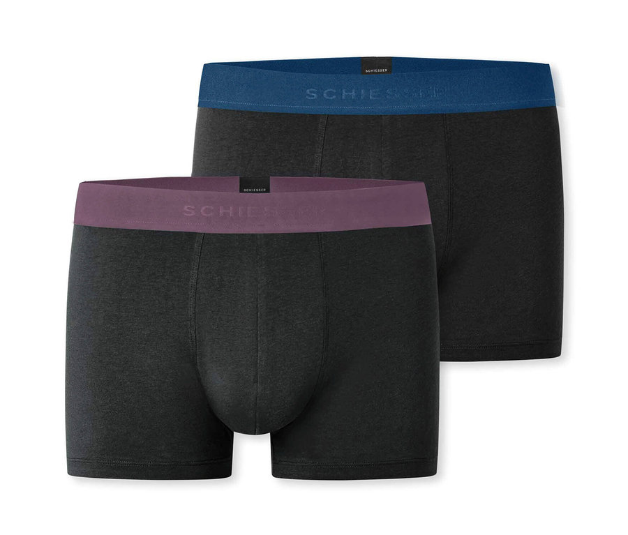 Zwei schwarze, lange SCHIESSER Slipboxer liegen übereinander.