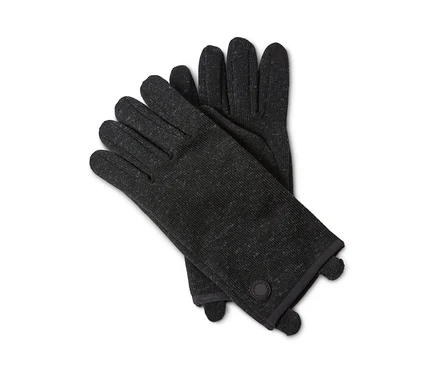 Zwei Strickfleece-Handschuhe liegen übereinander.