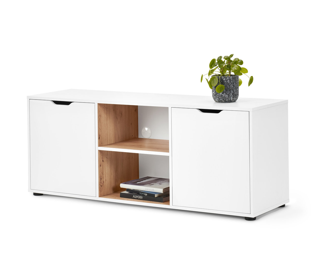 Weißes Sideboard mit Schubladen und Topfpflanze.