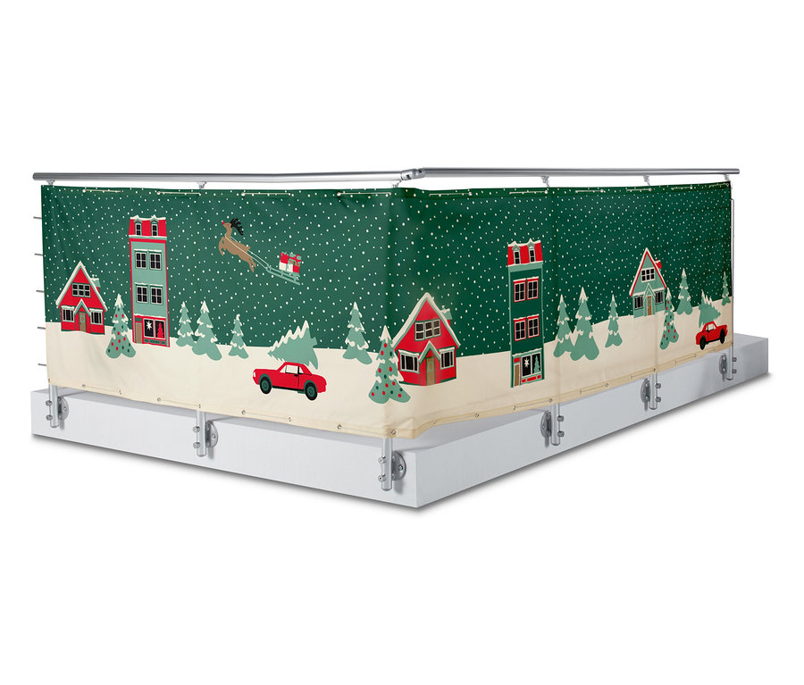 Balkonverkleidung mit Weihnachtsmotiv einer Schneelandschaft mit Häusern, Bäumen, Autos und einem Rentierschlitten.