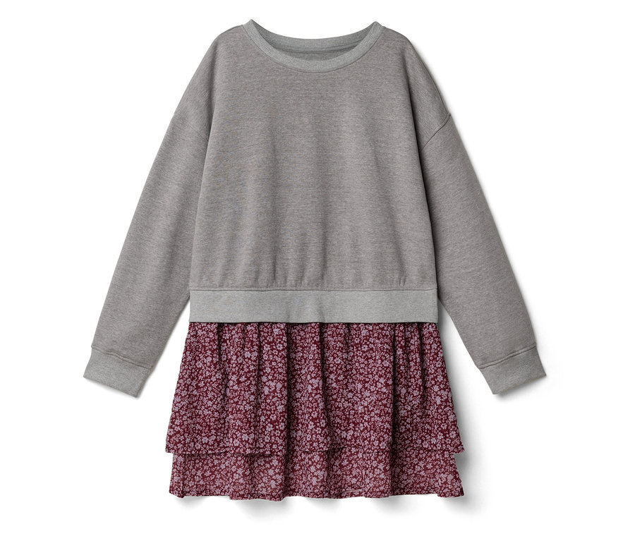 Ein Kleid mit einem grauen Langarm-Sweatshirt-Oberteil und einem gestuften, bordeauxroten Rock mit kleinem Blumenmuster.