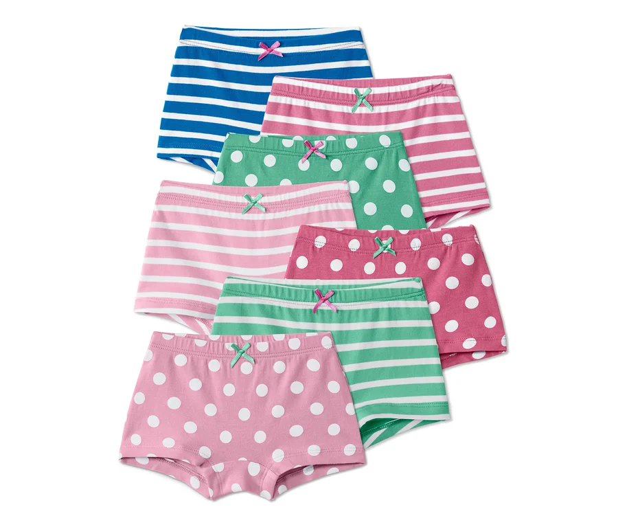 Sieben Pantys in verschiedenen Farben und Mustern, inklusive Streifen und Punkte.