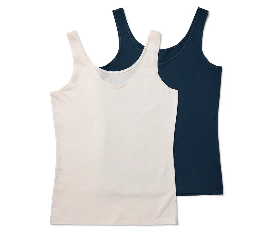 Zwei Tanktops: eines in Creme, eines in Dunkelblau.
