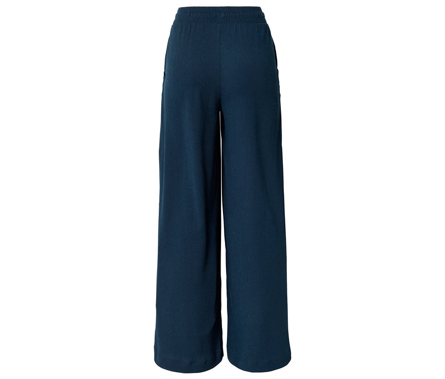 Dunkelblaue, weite Stoffhose mit elastischem Bund und Taschen, von hinten fotografiert.