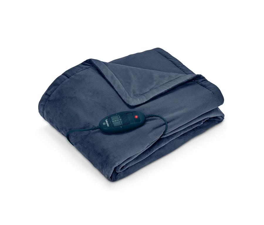 Zusammengelegte dunkelblaue Heizdecke mit Beurer-Controller und roter Kontrollleuchte.
