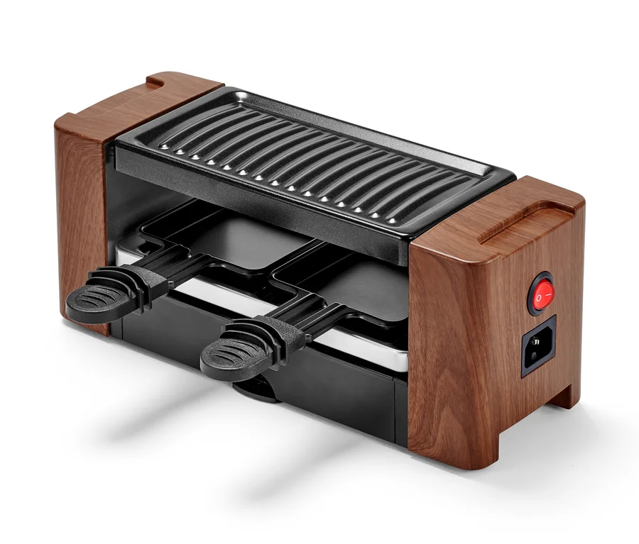 Raclette für 2 Personen mit Holzdekor und zwei Pfännchen.
