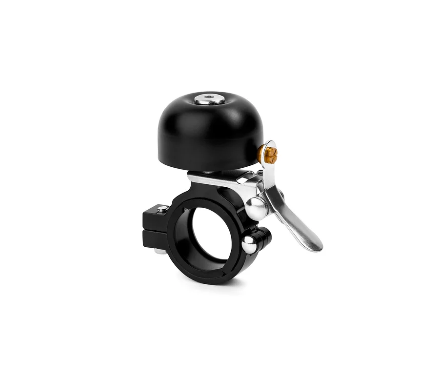 Eine schwarze Fahrradklingel.